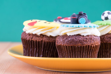 Delicious cupcakes on table
