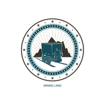 Mining Land, Logo Design Element, Coal Mine Trolley against Mountains and Sunburst, Label and Badge Mine Shaft,Emblem of the Mining Industry, Vector Illustration