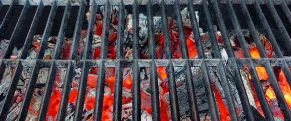 Hot Barbecue Grill With Glowing Charcoal Background