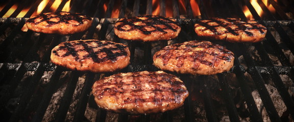 Grilled Burgers Patties On The Hot Flaming Grill