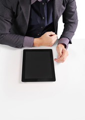 hands holding and pointing on contemporary tablet