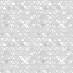 Seamless pattern of triangles, gray background. Vector