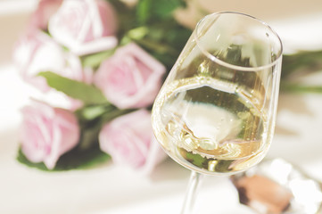 Wine and flowers on the table