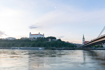 Naklejka premium Bratislava, Slovakia - Castle, parliament and St. Martin cathedral, sunset view