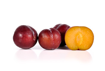 Plums close up isolated on white background
