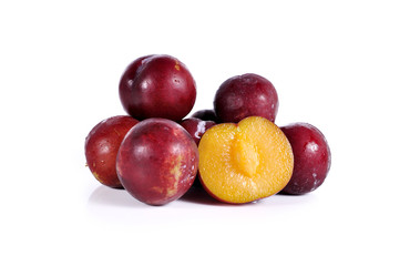 Plums close up isolated on white background
