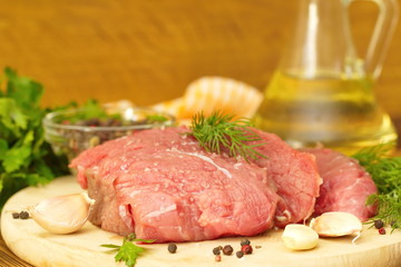 Raw meat with spices and vegetables ready for cooking