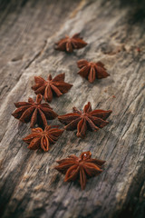 Heap of Star Anise, on wooden surface.