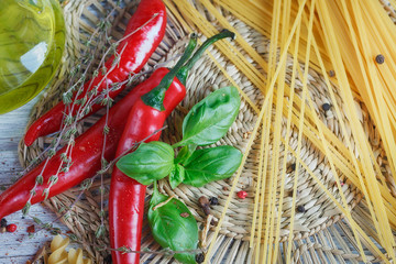 Italian food background, with  tomatoes, basil, spaghetti, olive