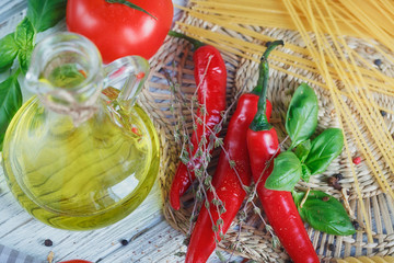 Italian food background, with  tomatoes, basil, spaghetti, olive