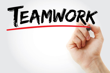 Hand writing Teamwork with marker, business concept