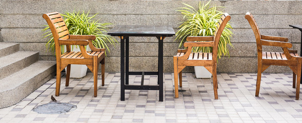Fototapeta na wymiar Table and chairs outdoors