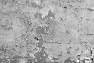 Wall fragment with scratches and cracks