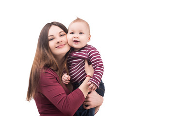 happy mother holding her cute baby. portrait of mom and child on white background, isolated. happy family concept