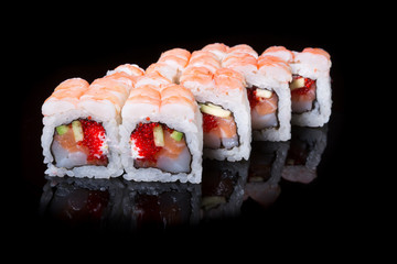 Japanese rolls on black background