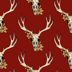  deer skull  and lily on a red background vector seamless pattern