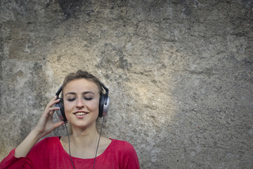 Blonde girl listening to music
