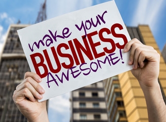 Make Your Business Awesome placard with cityscape background