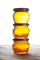 Bright yellow jam - dandelion flower honey. Selective focus. Sha