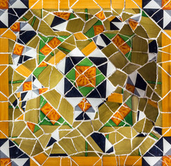 Fototapeta na wymiar Broken glass tile, decoration in Park Guell, Barcelona, Spain