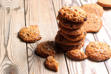Stack of cookies and pieces on a wooden table