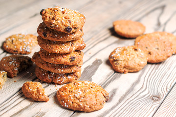 Stack of cookies and pieces on a wooden table