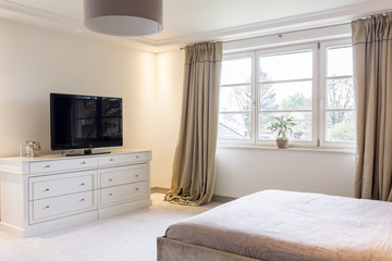 Relax in beautiful bedroom with tv