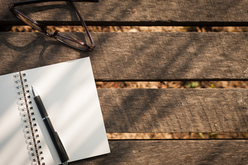 Notepad on wood table