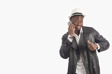 Young african american man using a mobile phone 