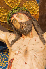 AVILA, SPAIN, APRIL - 19, 2016: Crucifixion in church of Real monasterio de Santo Tomas from 16. cent.  in chapel Capilla del Cristo de la Agonia (St. Theresia often prayed in front of this Christ). - obrazy, fototapety, plakaty