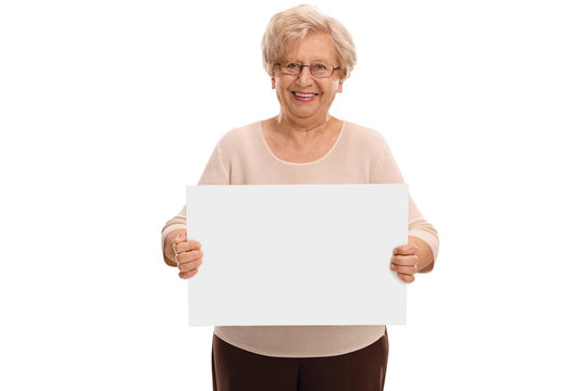 Senior Lady Holding A Blank Signboard