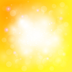 Yellow abstract background with light, blurs, shining spots.
