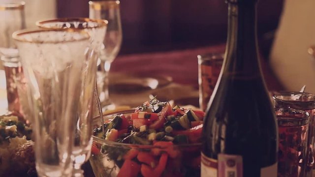 Decorated table with Glass of wine with food on table in slowmotion. 1920x1080
