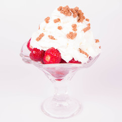 Strawberries with whipped cream and granola