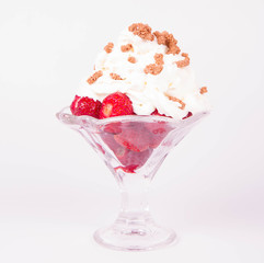 Strawberries with whipped cream and granola