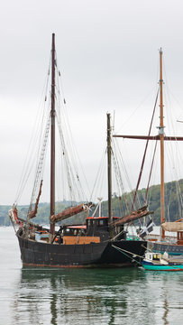 Traditional wooden sailing vessel moored in the river Fal in Cornwall 