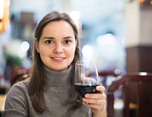 Young woman with wine.