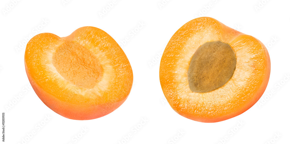 Wall mural Two fresh slices of apricot isolated on white background. One slice with core. Design element for product label, catalog print, web use.