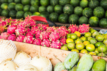 Fruit market with various colorful fresh fruits and vegetables