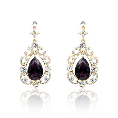 Pair of diamond earrings isolated on white

