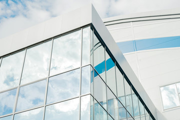The angle of view of the beautiful modern futuristic building. Business concept of successful industrial architecture.