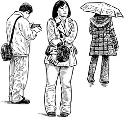 casual people on the bus stop