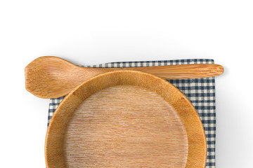 blank wooden plate with spoon on table