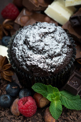 chocolate muffins with icing sugar and ingredients 