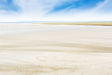 Heart symbol on the beach