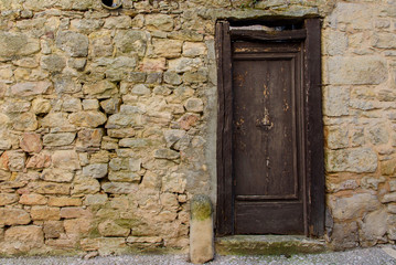 Fototapeta na wymiar Stone wall and door