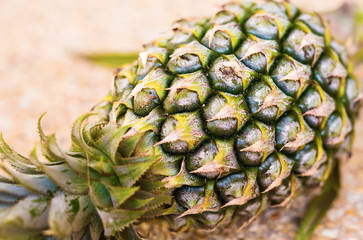 Ripe pineapple lying. Fruits, diet, healthy food concept