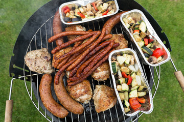 barbecue with delicious grilled meat on grill