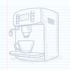 Coffee maker with cup.