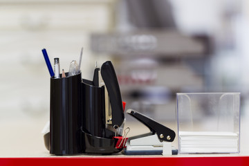 Stationery set against a background of office interior